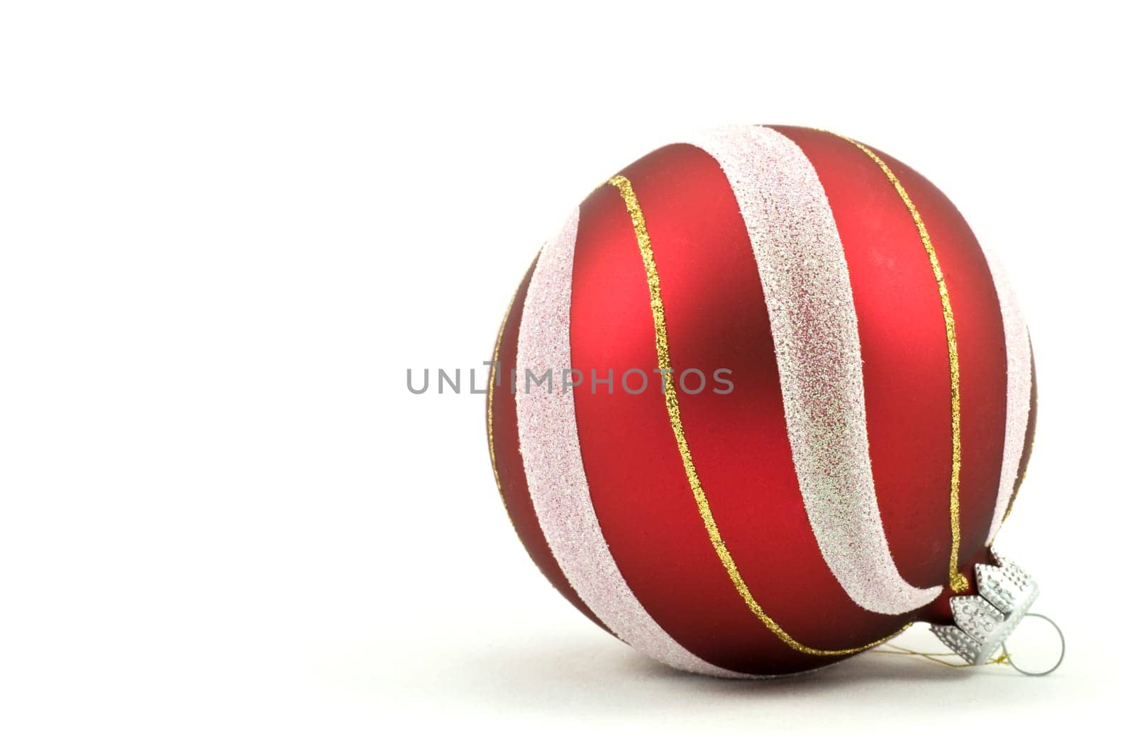 red christmas ball with ornament. Isolated on white