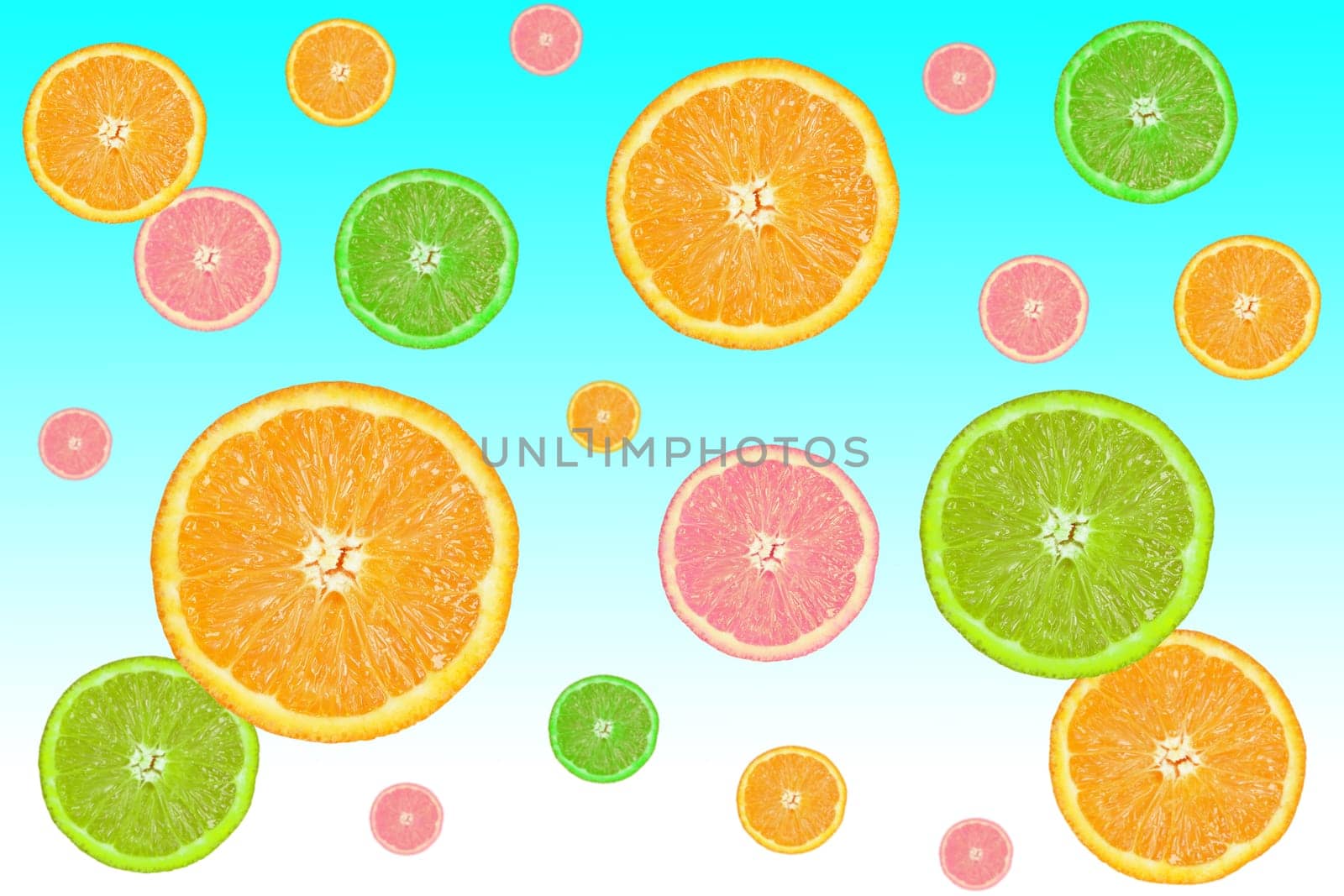 colorful slices of citrus fruits on a blue background