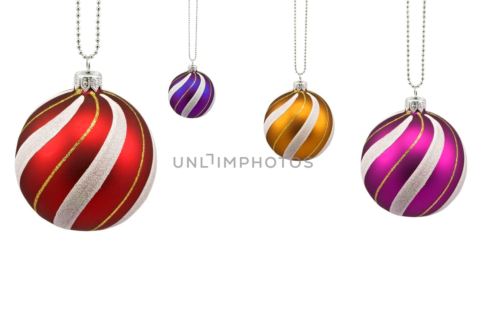 four colorful christmas baubles isolated on white