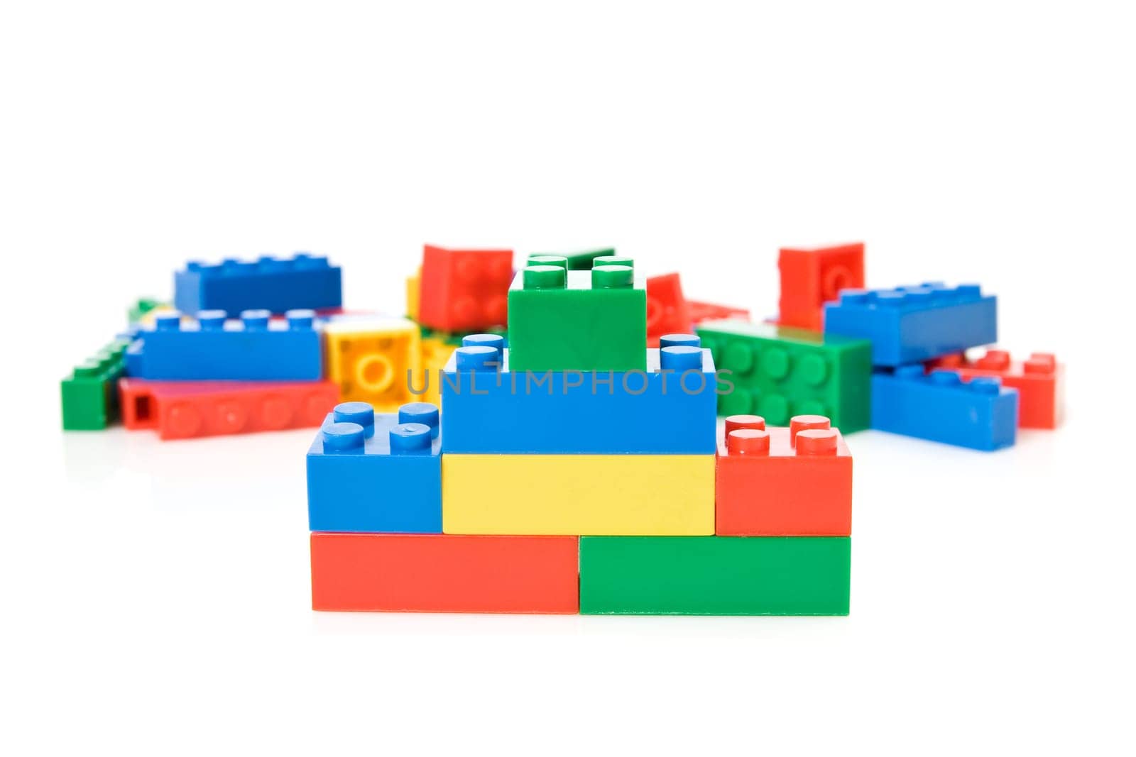 colorful plastic toys over a white background