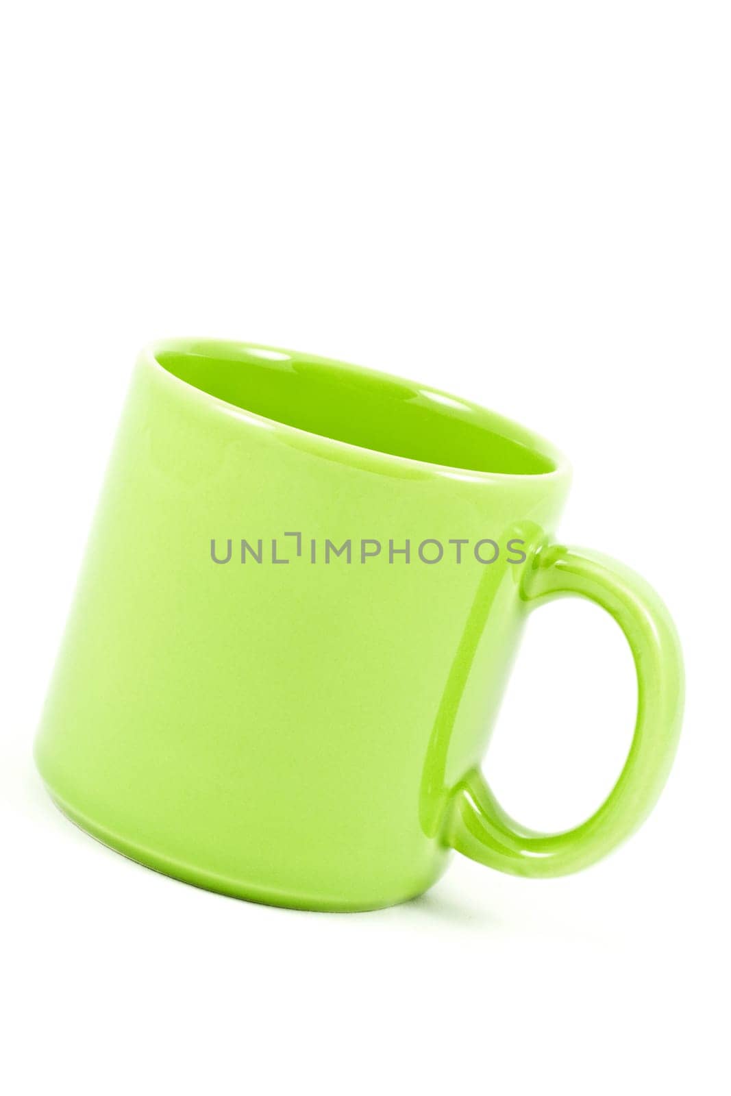 green ceramic cup isolated on white background