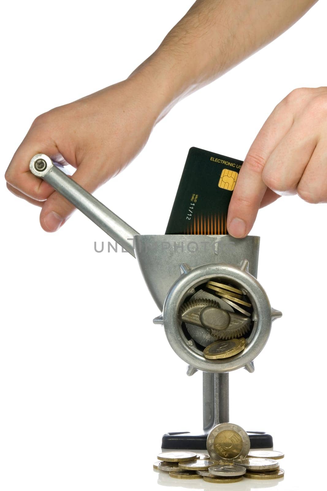 Money concept. credit card mincing in a meat grinder
