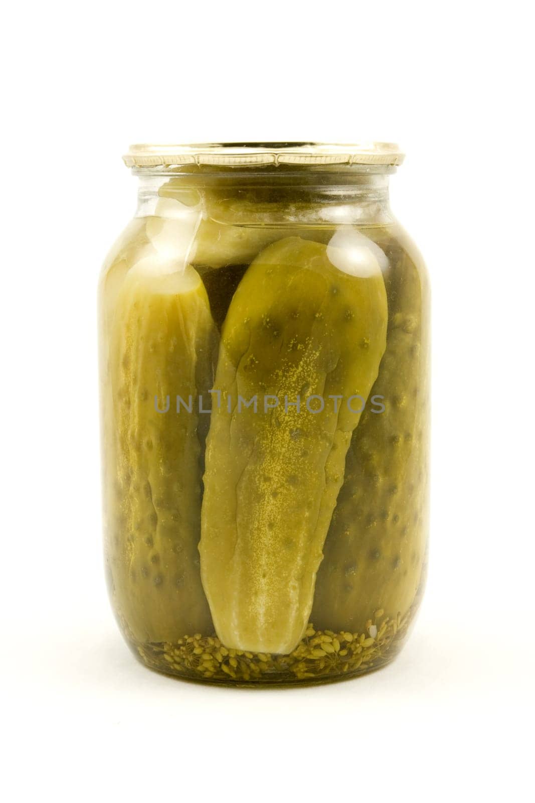 clear glass jar with cucumbers on a white background