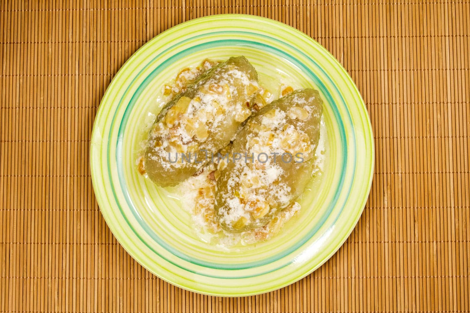 plate with potato dumplings on a bamboo tablecloth