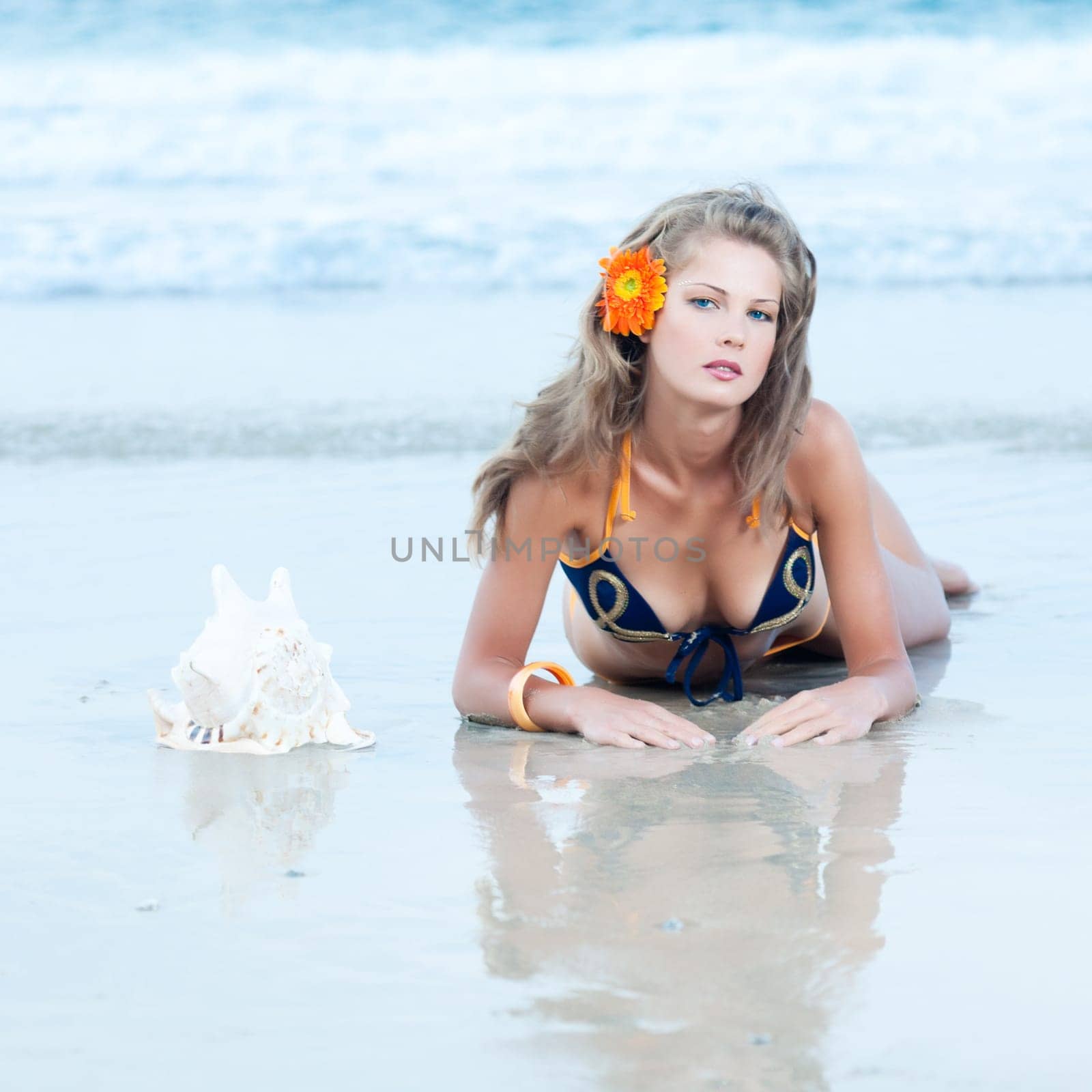 Beautiful woman in bikini on the beach