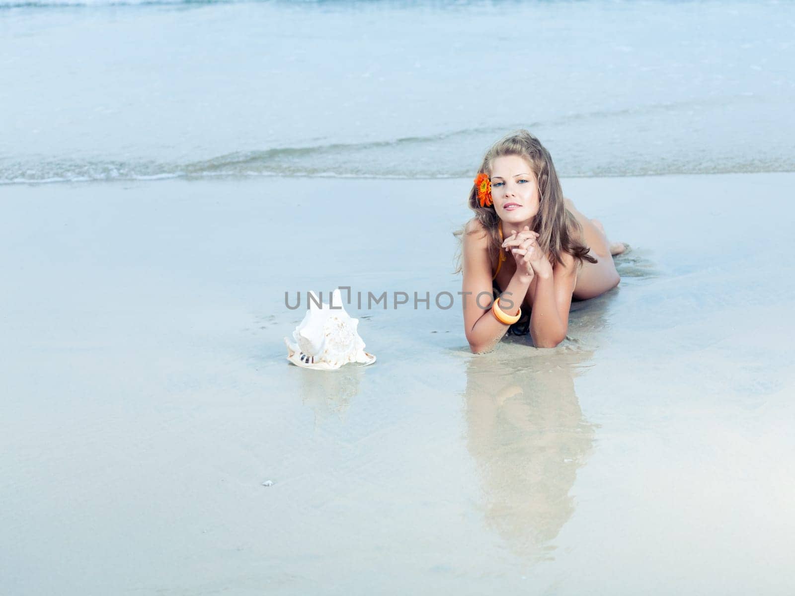 Beautiful woman in bikini on the beach