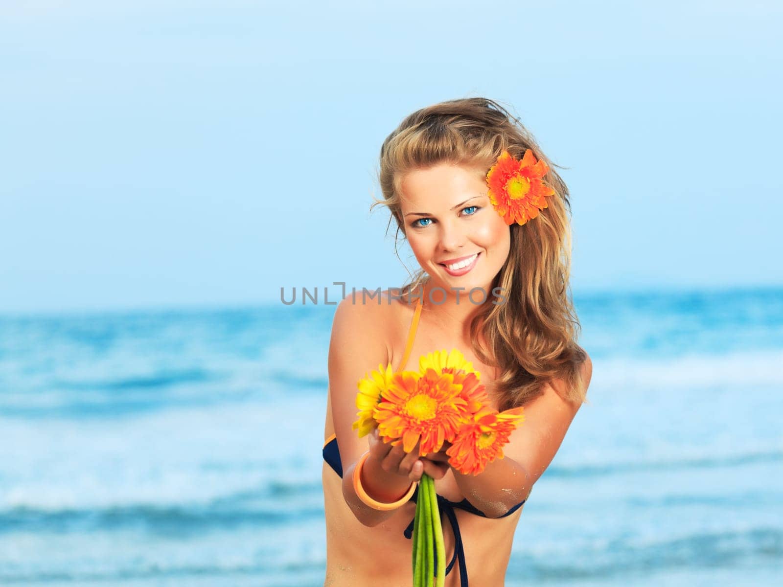 Beautiful woman in bikini on the beach