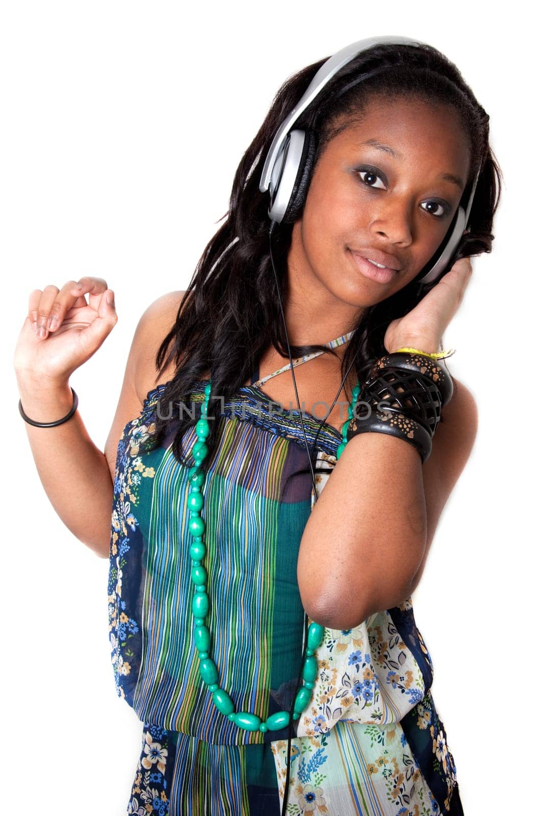 Young African American Teenage Girl Listening to Music, Isolated on White Background