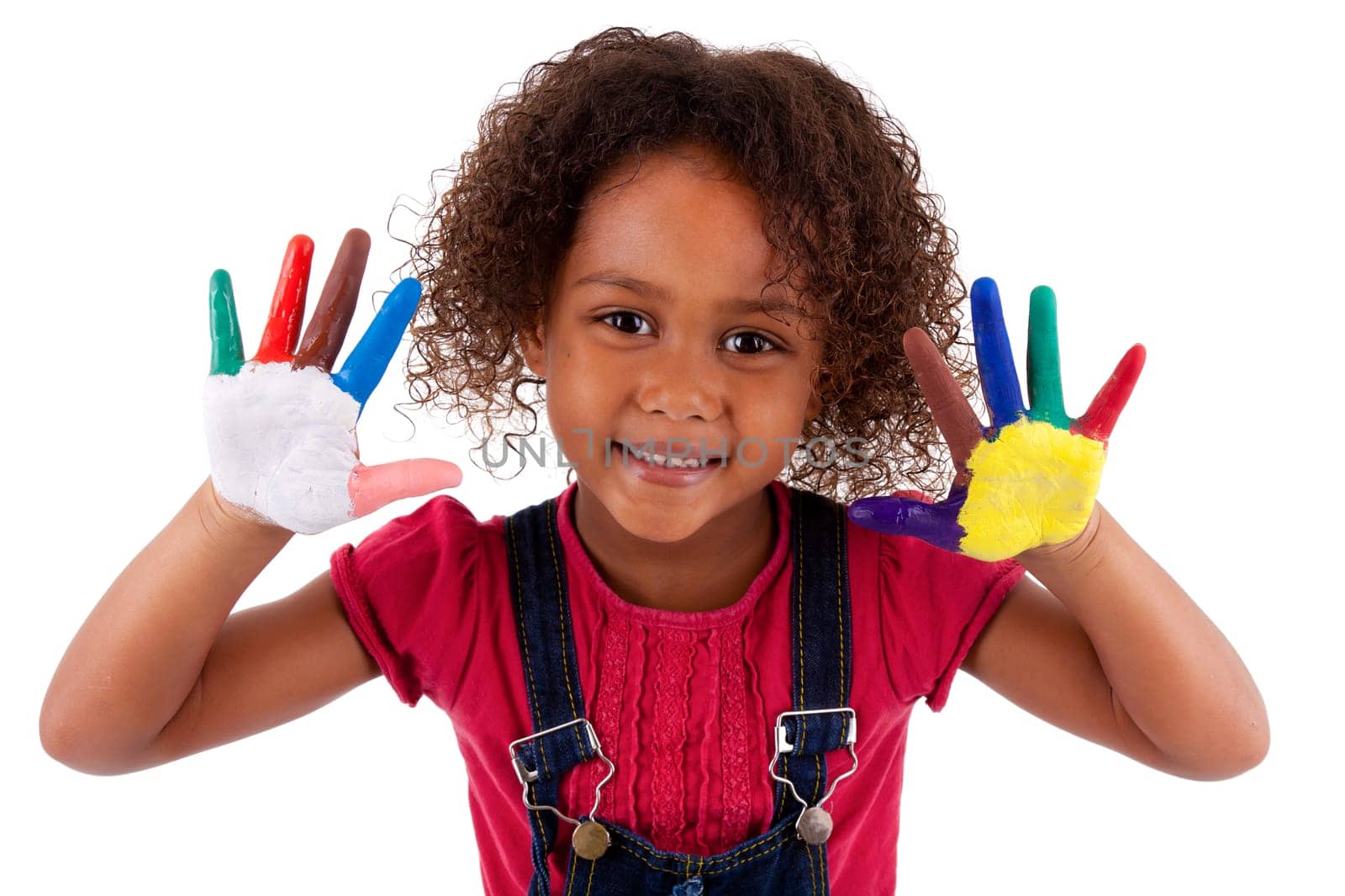 Little African Asian girl with hands painted in colorful paints