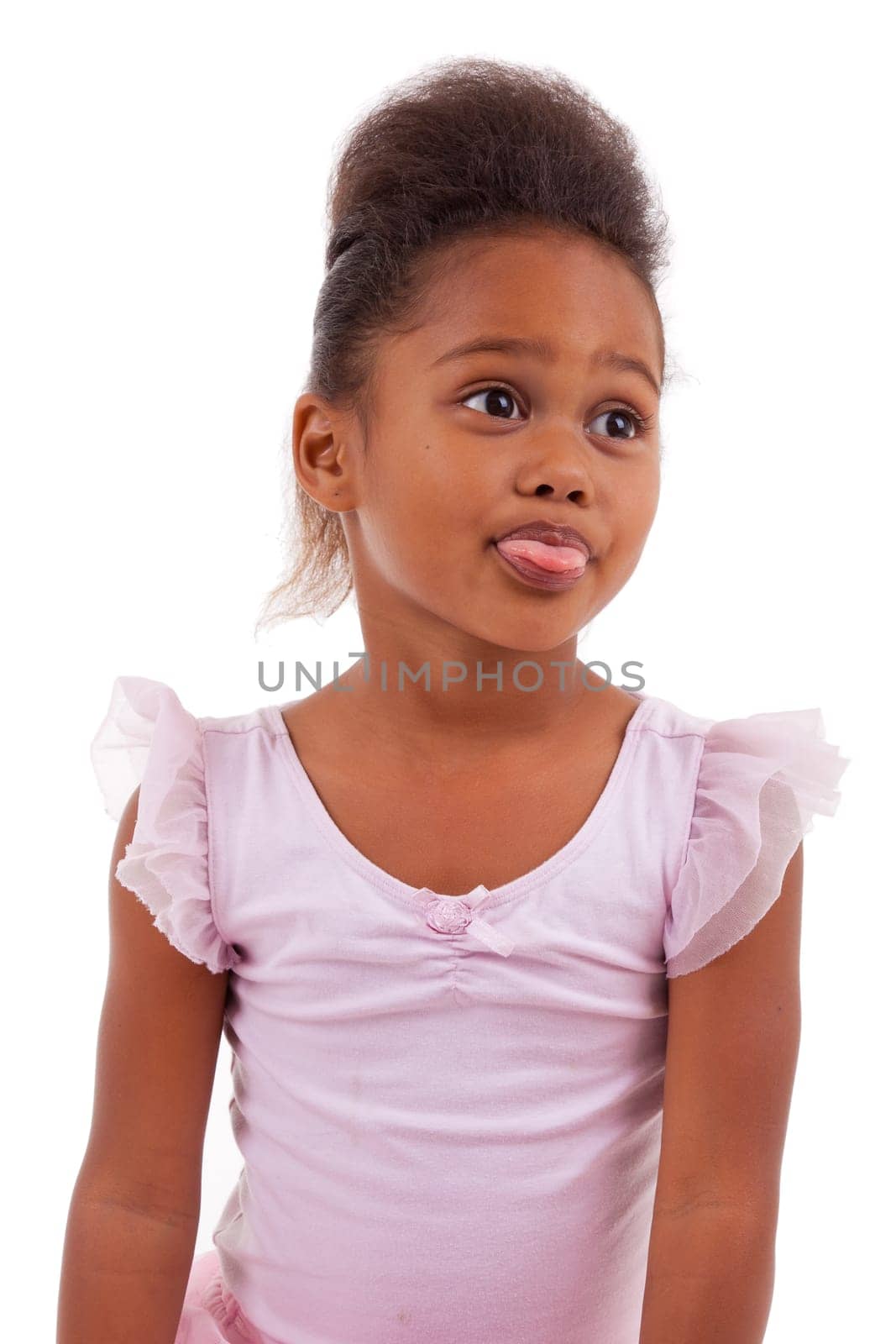 Cute little African Asian girl sticking tongue out, isolated on white background