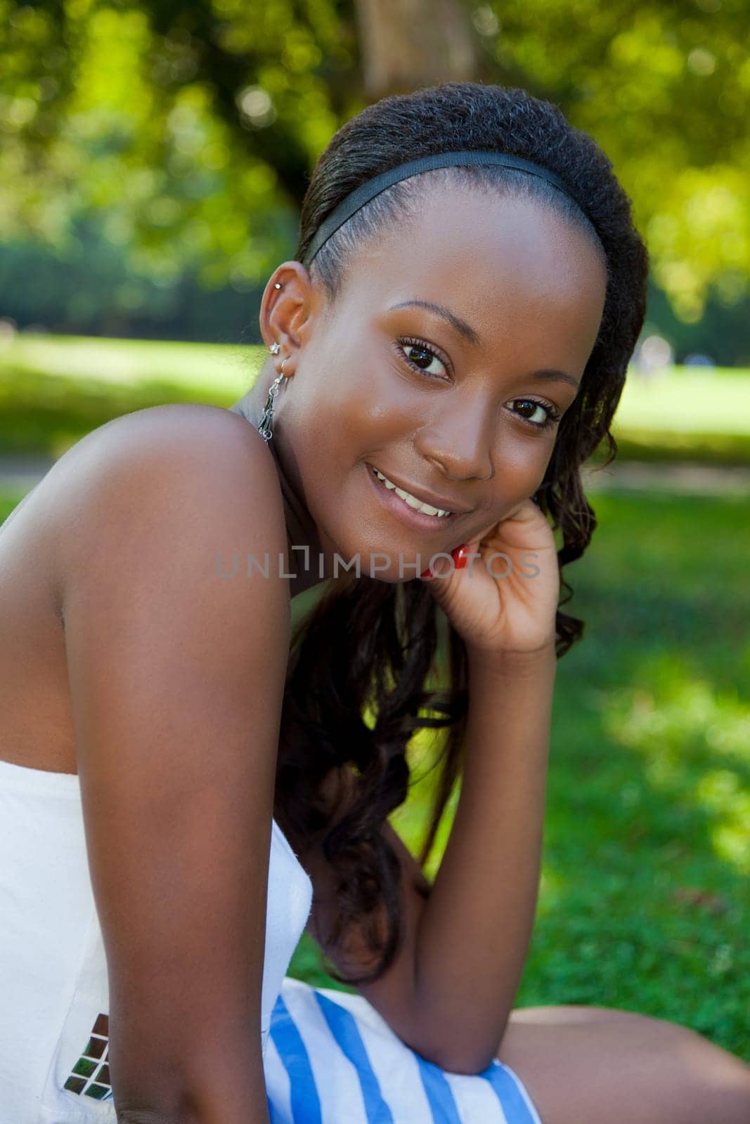 Outdoor portrait of a young beautiful african american girl