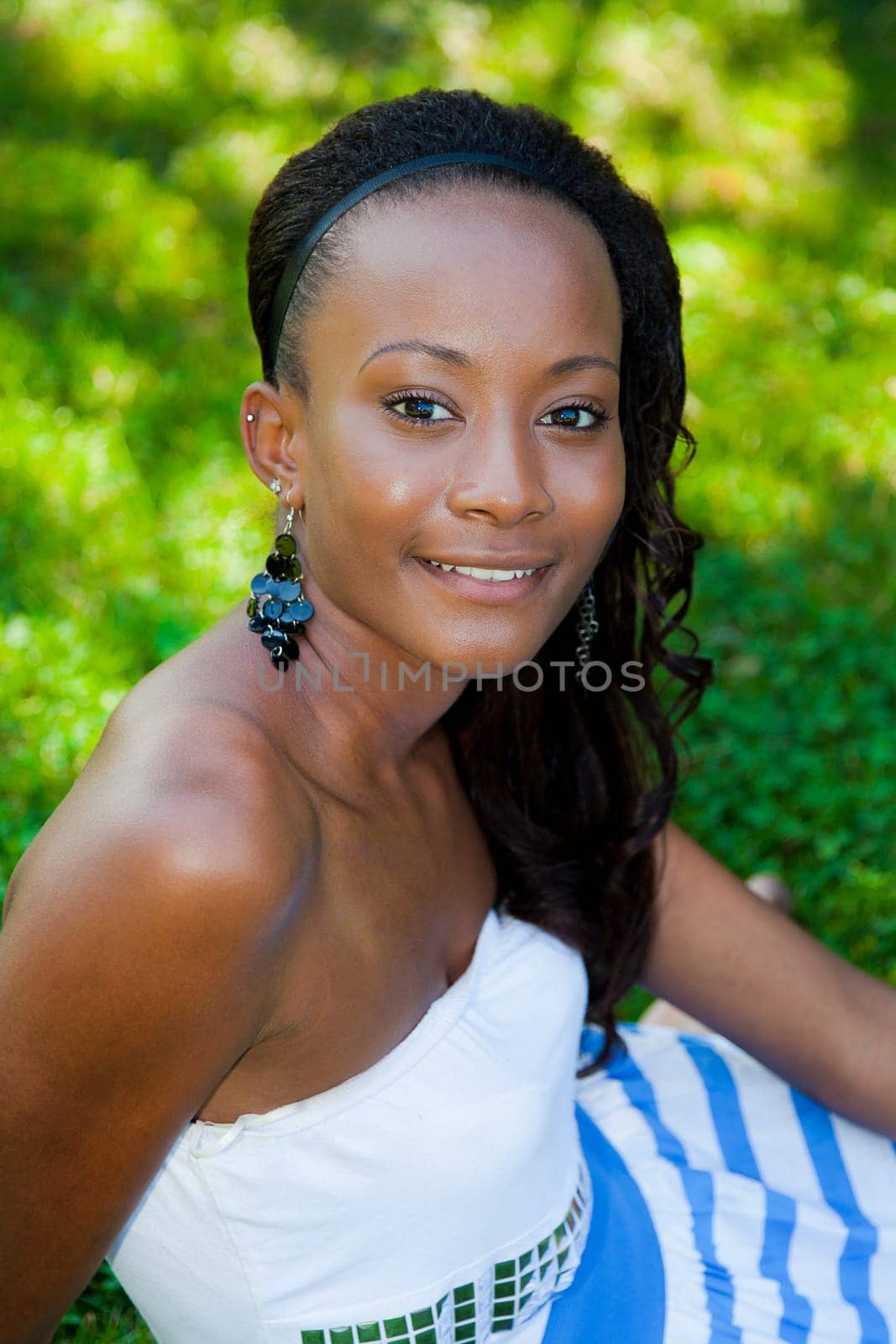 Outdoor portrait of a young beautiful african american girl
