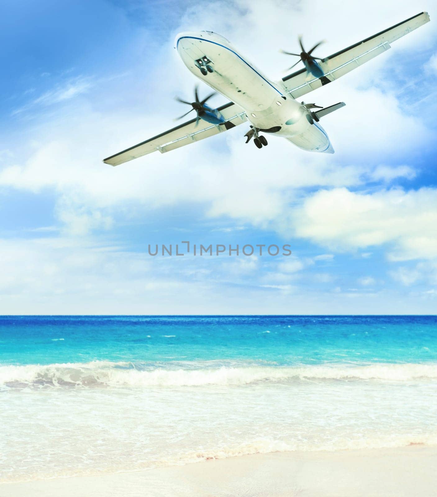 Airplane landing over the tropical lagoon at sunny day
