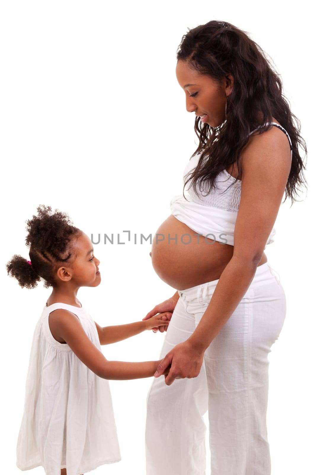 Pregnant black woman with her daughter