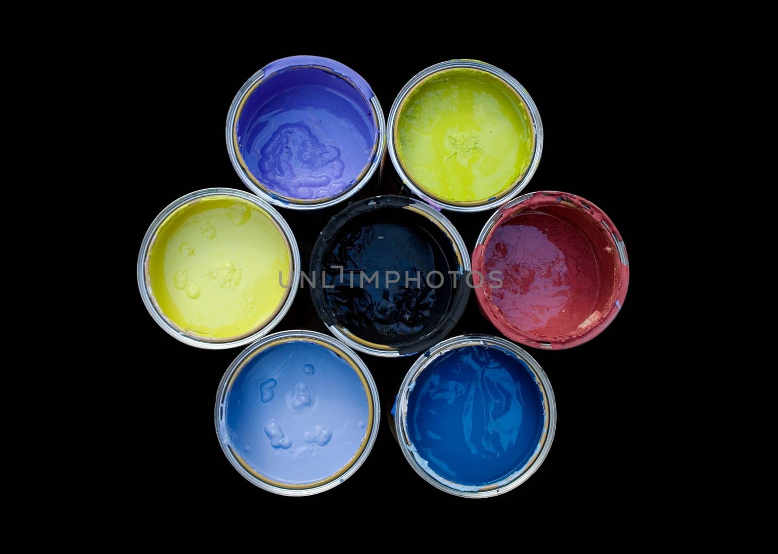 Various Colors cans on a black background