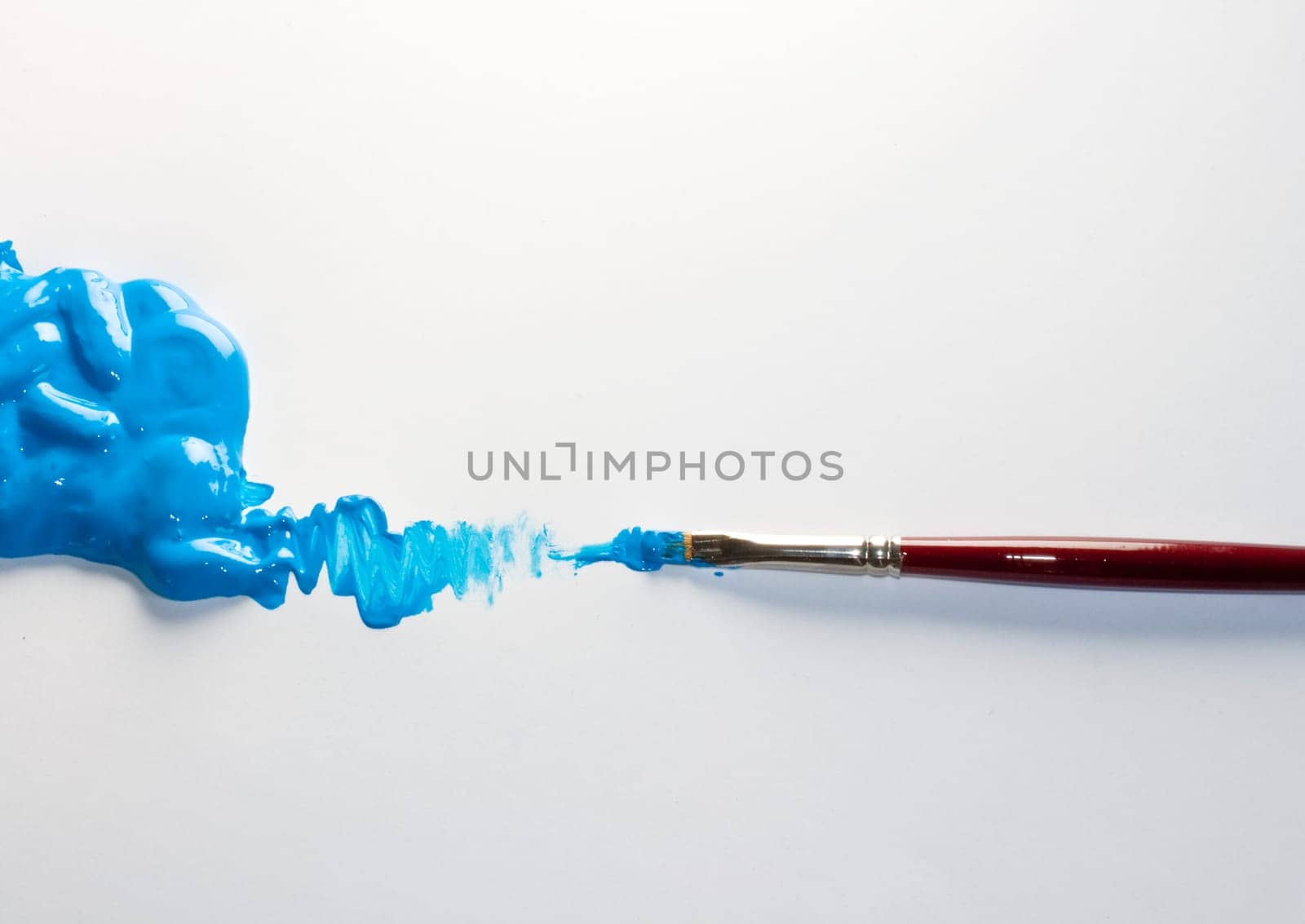 Paintbrushes with Blue Colors on white
