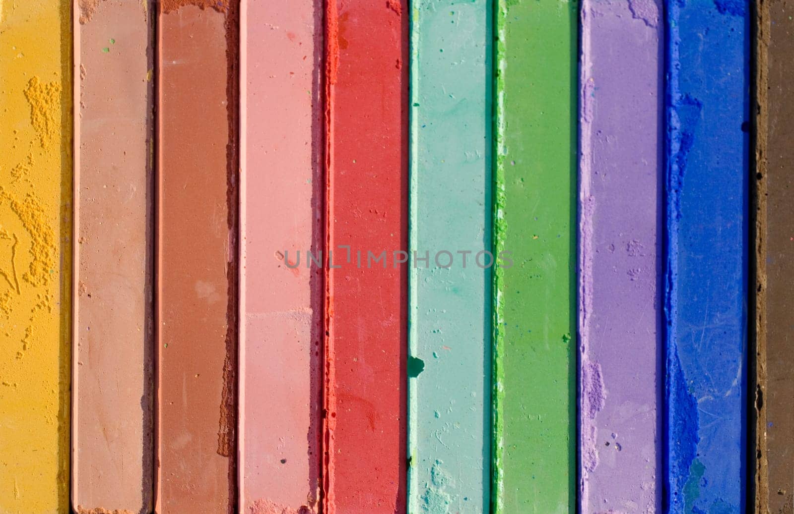 Photo of Colorful chalks background