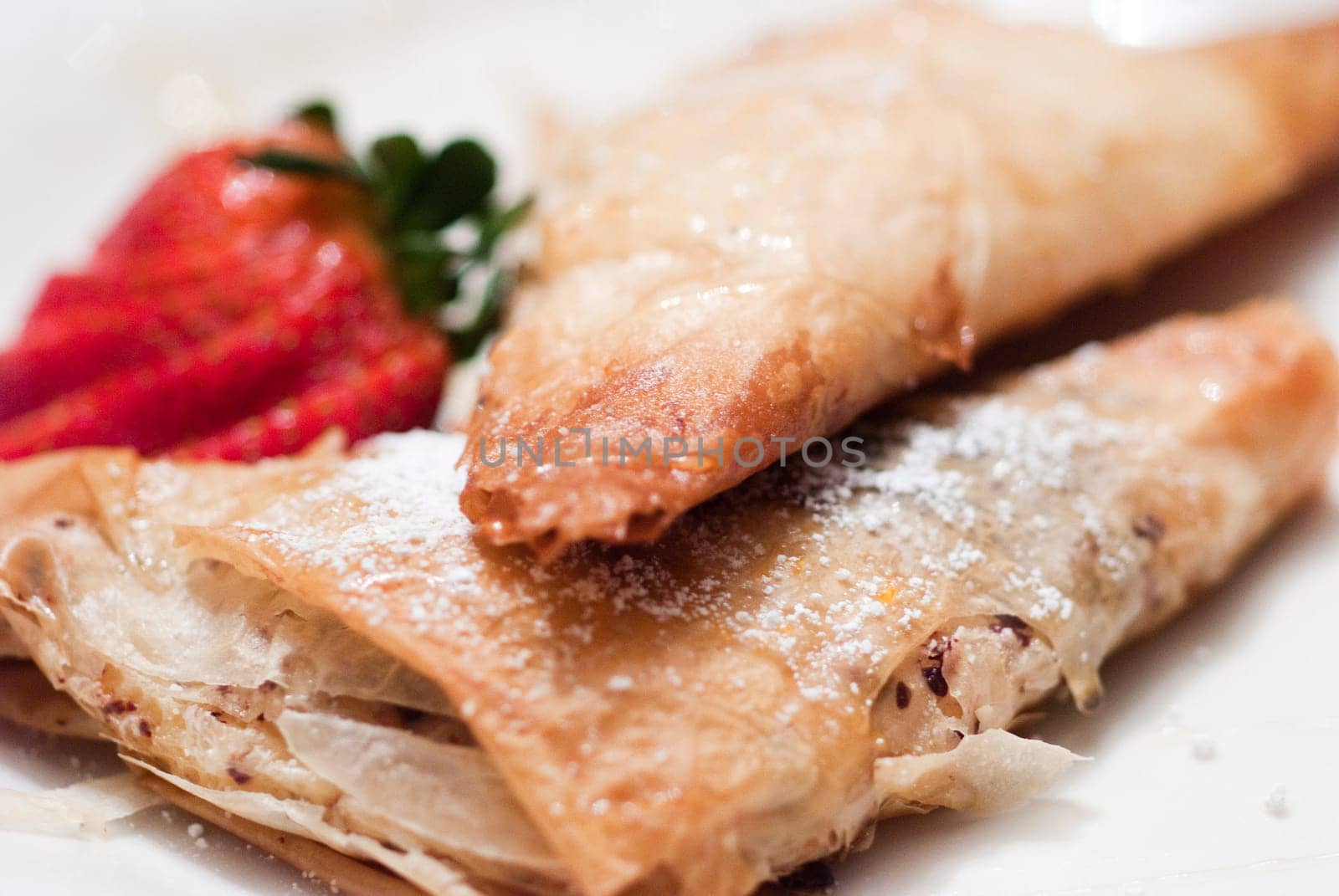 Filled Apple Pastries with Strawberries and Sugar