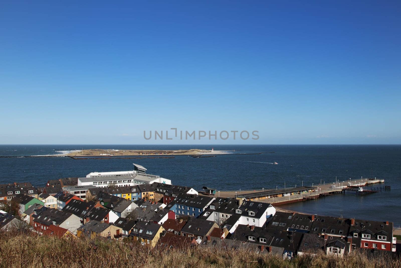 View from over the lowlands and the harbour of Heligoland to the neighbouring island of Düne