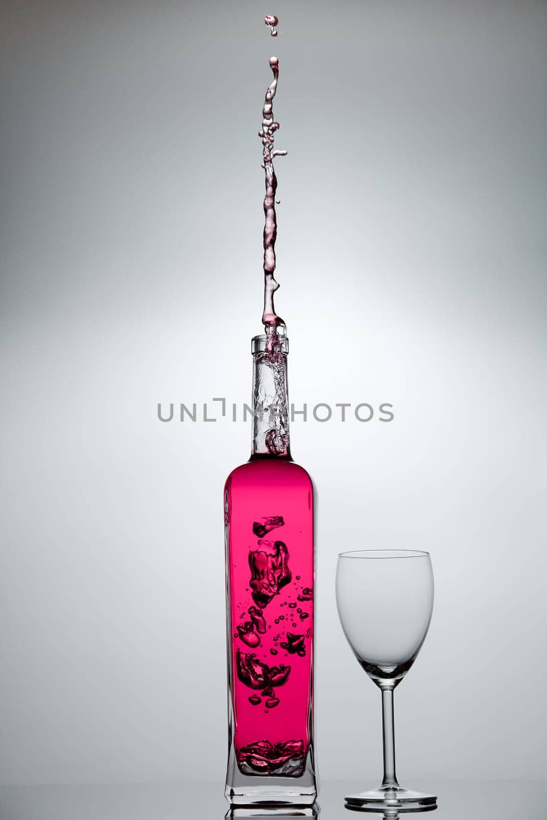 Liquid splashing from a glass bottle