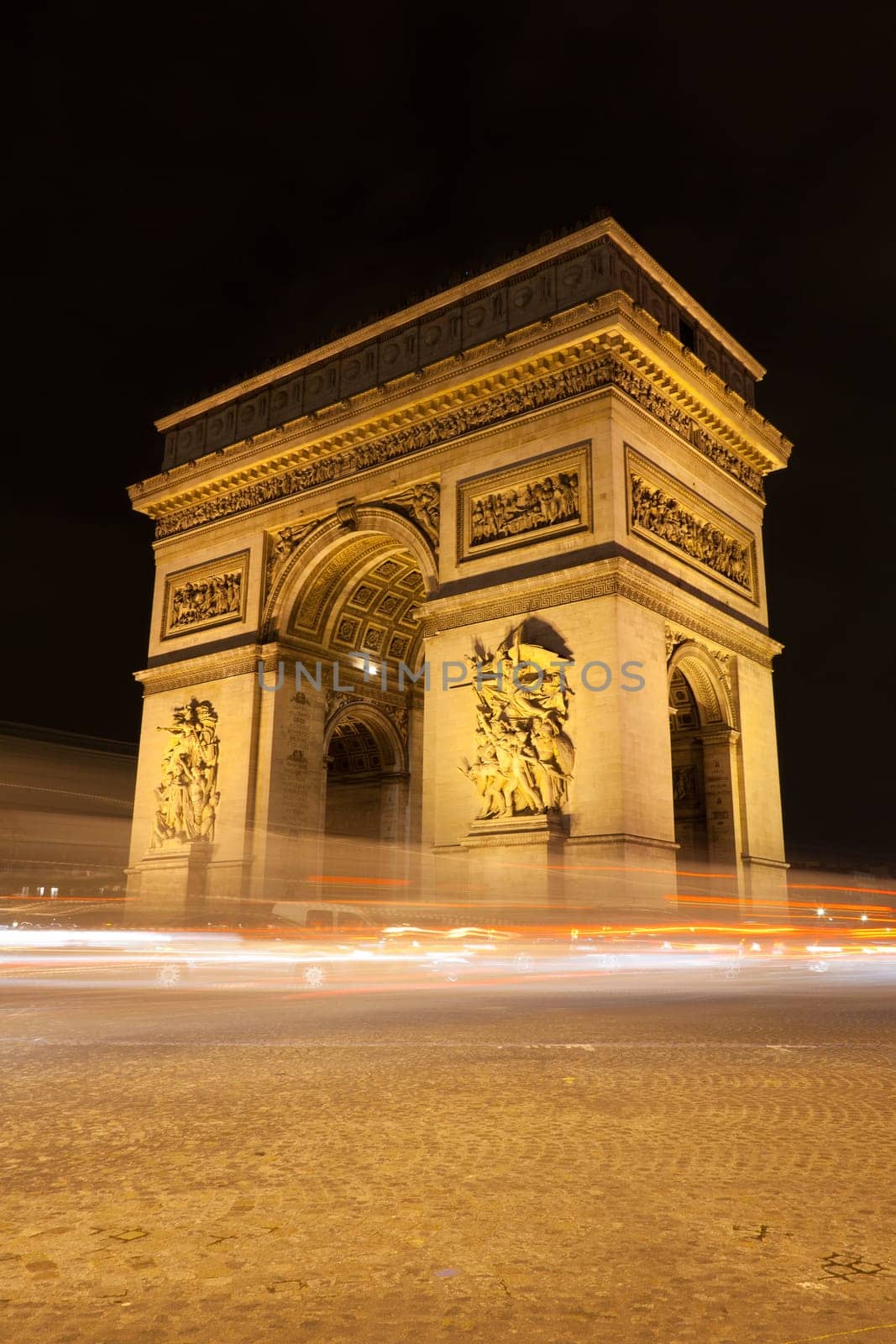 Arc de Triomphe - Arch of Triumph by night in Paris, France