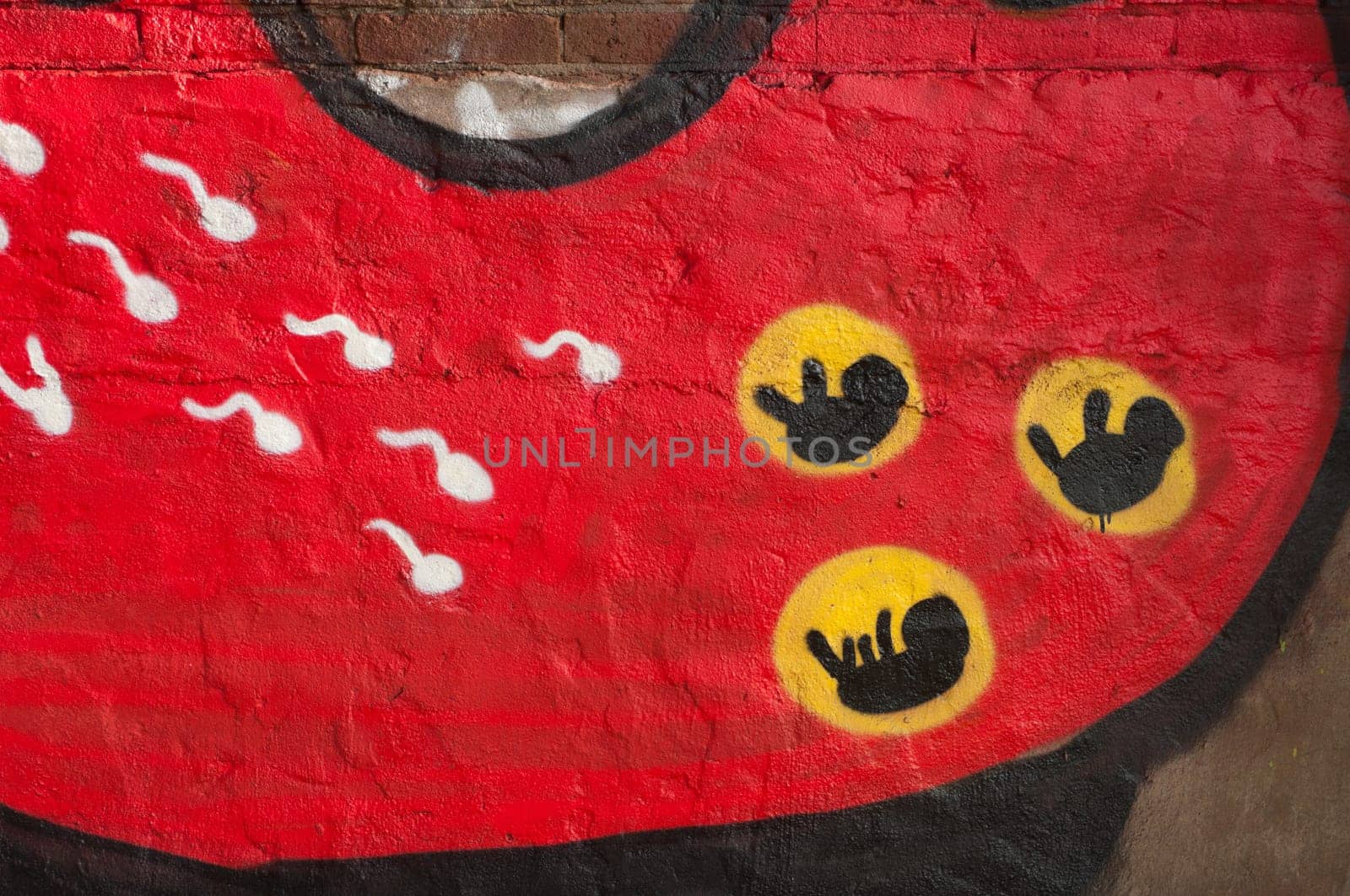 grafiti painting about fertilisation on a wall
