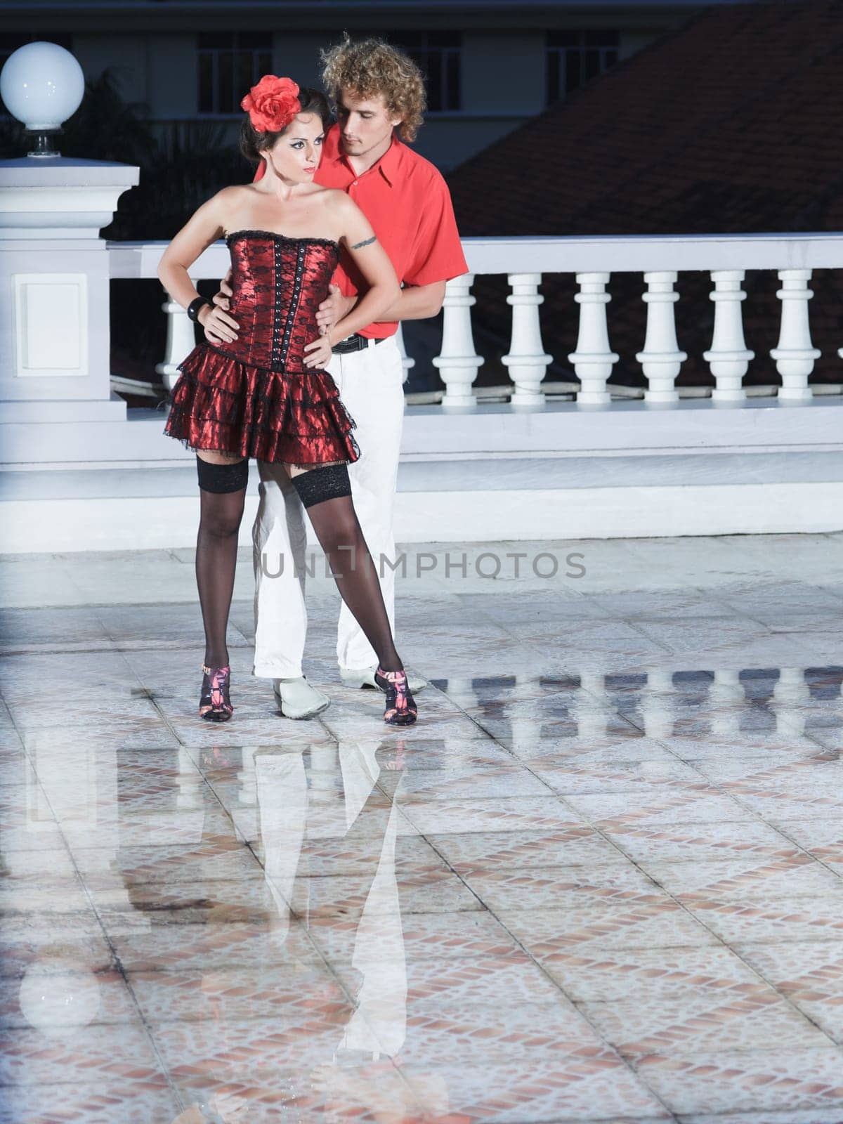Couple dancing tango at the night time