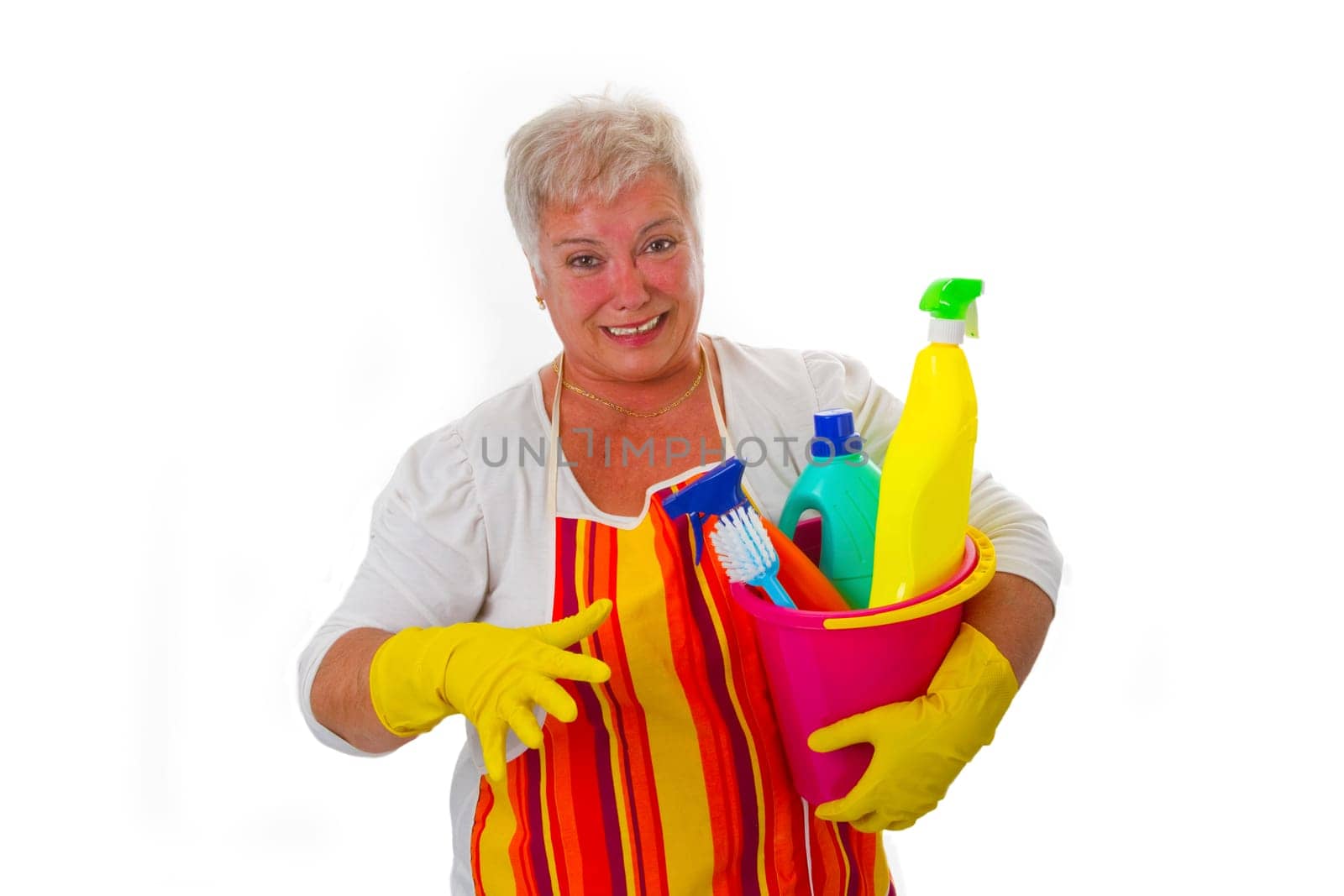 Senior woman with cleaning supplies - isolated on white background