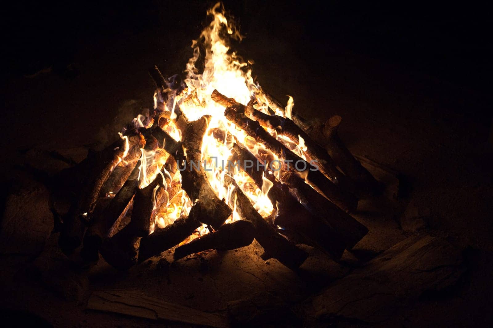 Roaring camp fire in the bush, South Africa