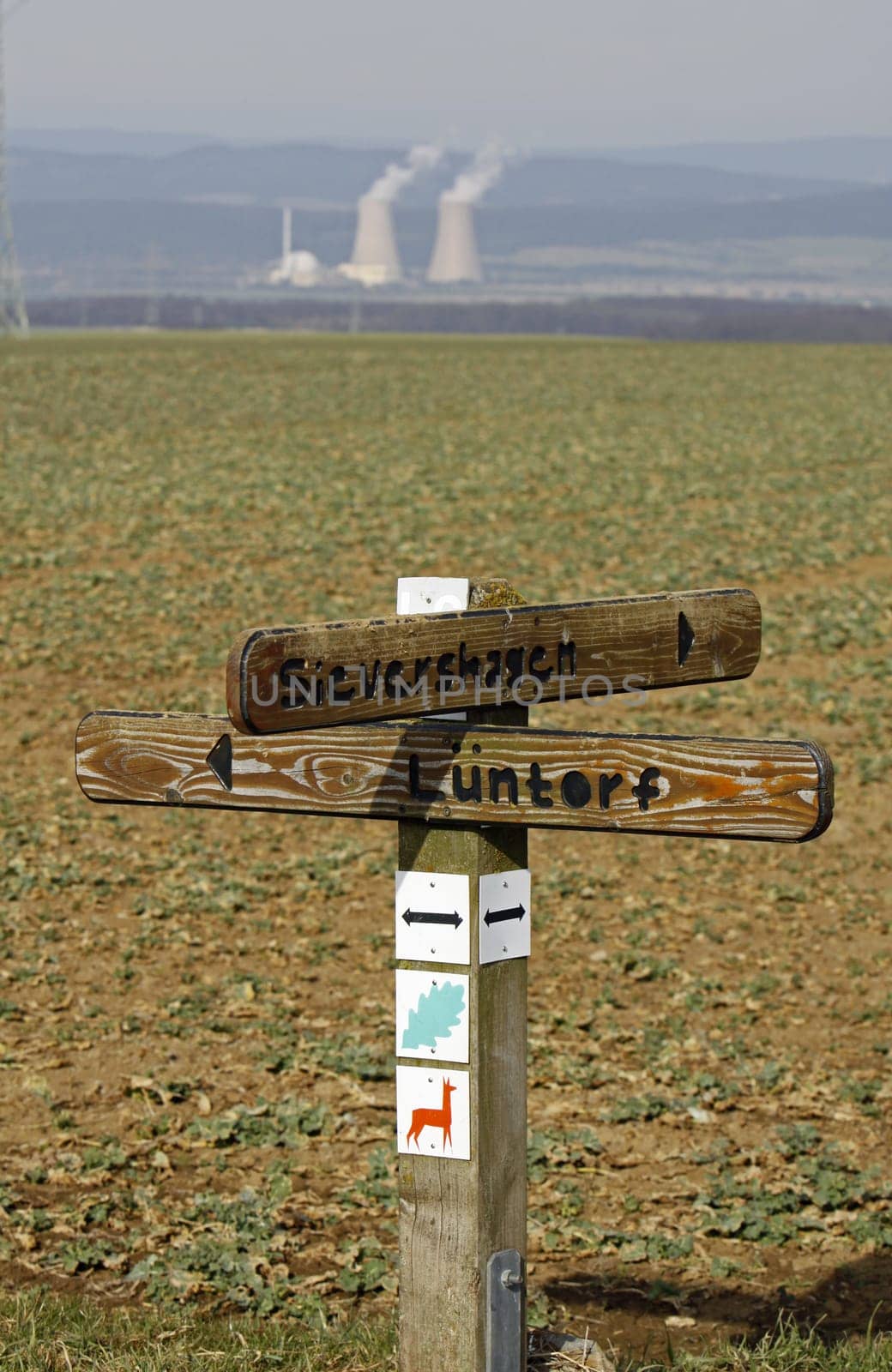 Signpost Lichtenhagen with Grohnde nuclear power plant
