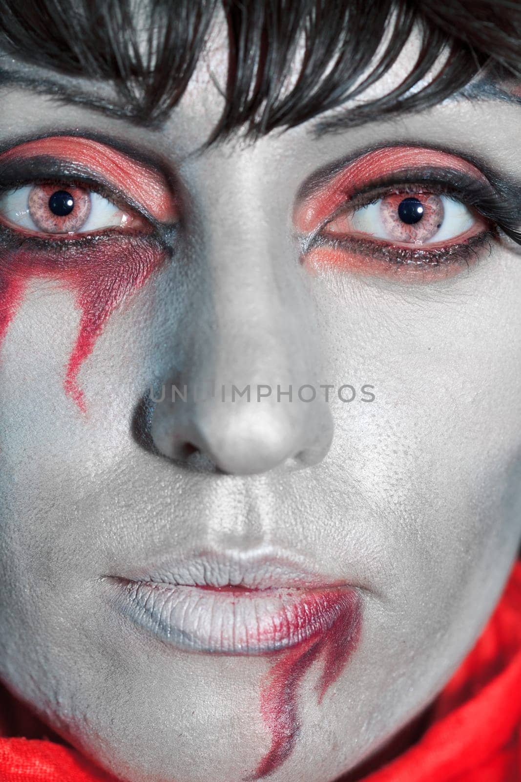 Woman as a vampire. Halloween face art