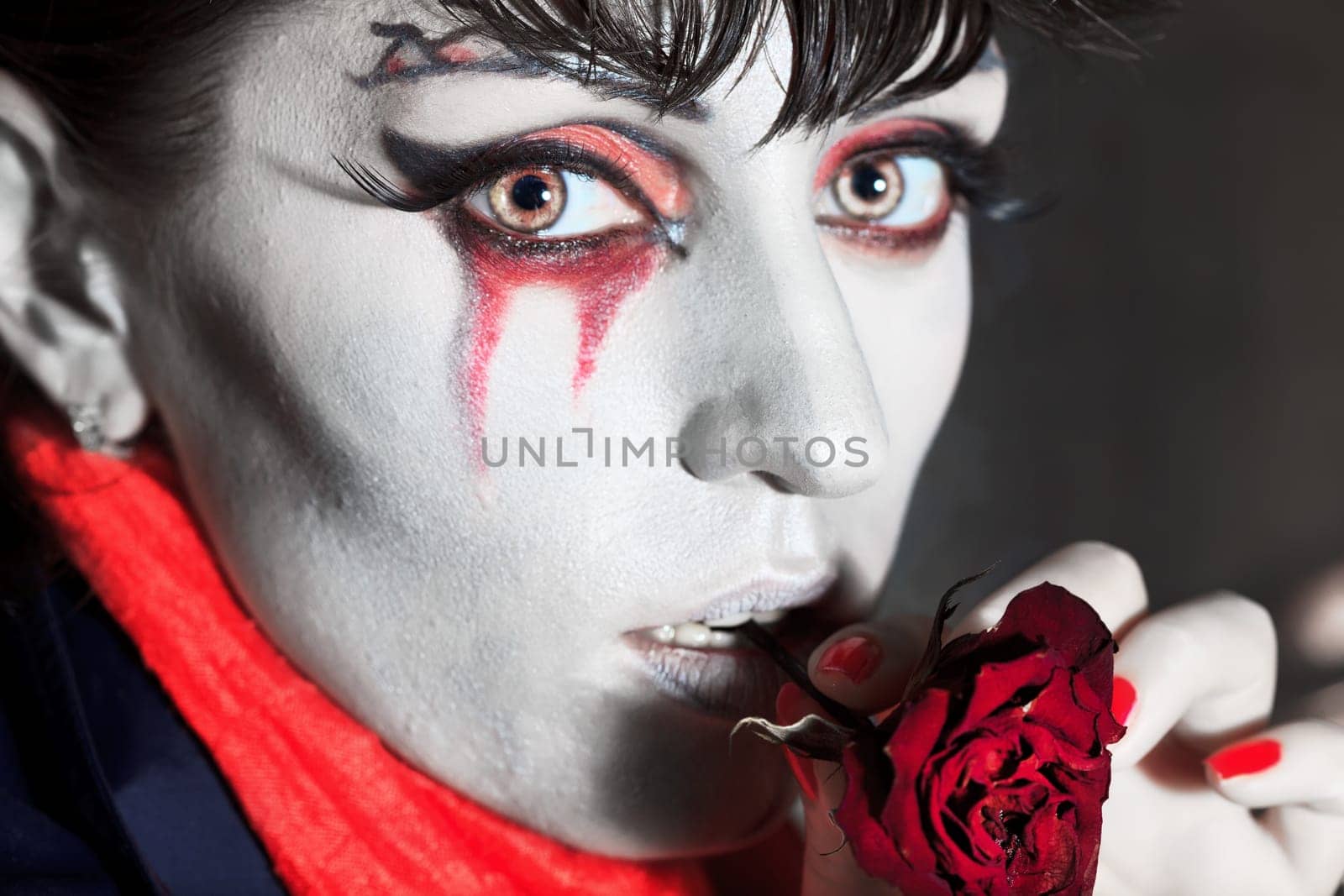 Woman as a vampire. Halloween face art