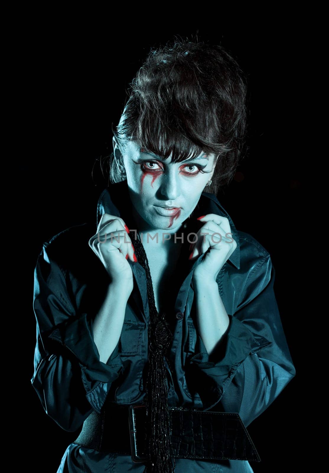 Woman as a vampire. Halloween face art