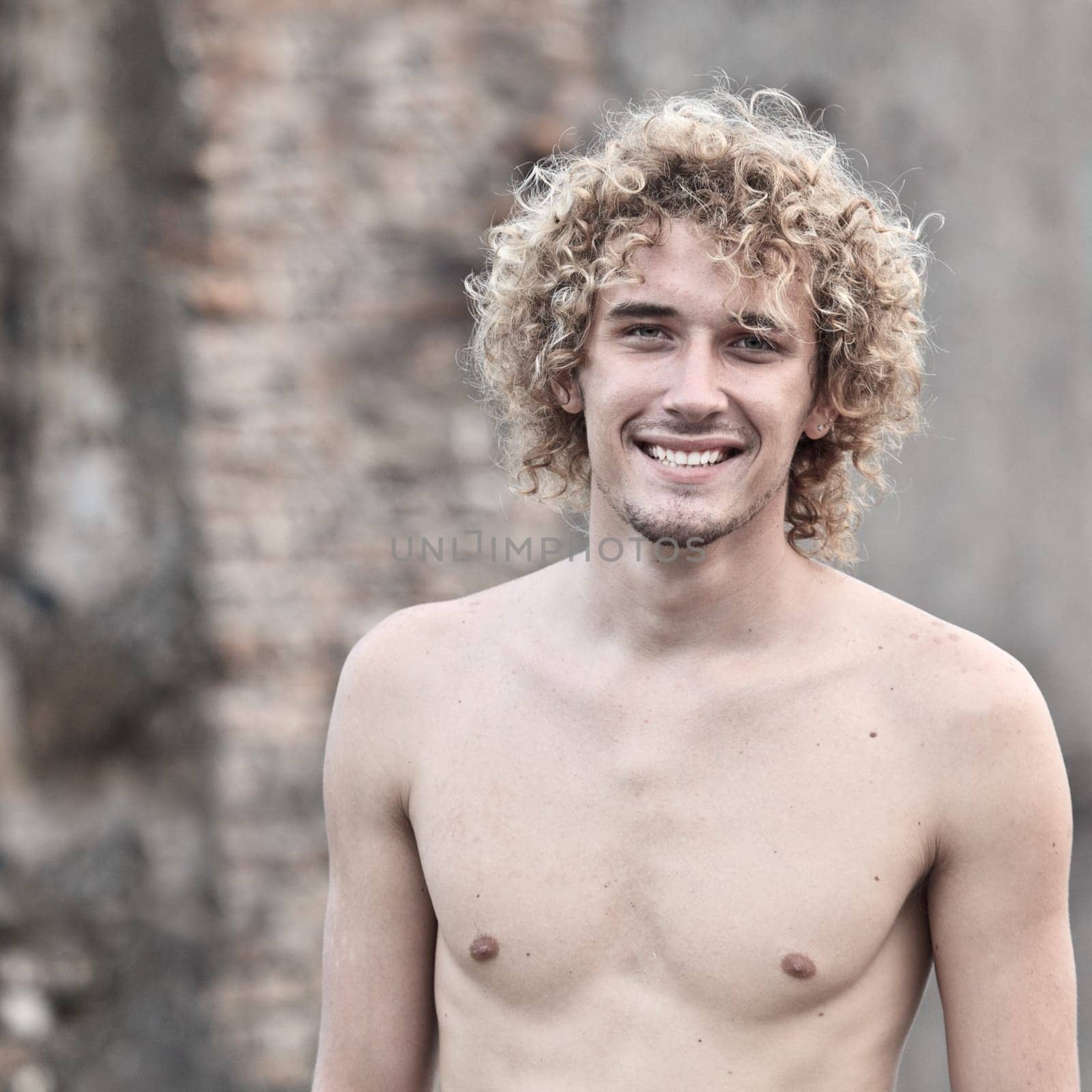 Portrait of a young smiling man outdoor