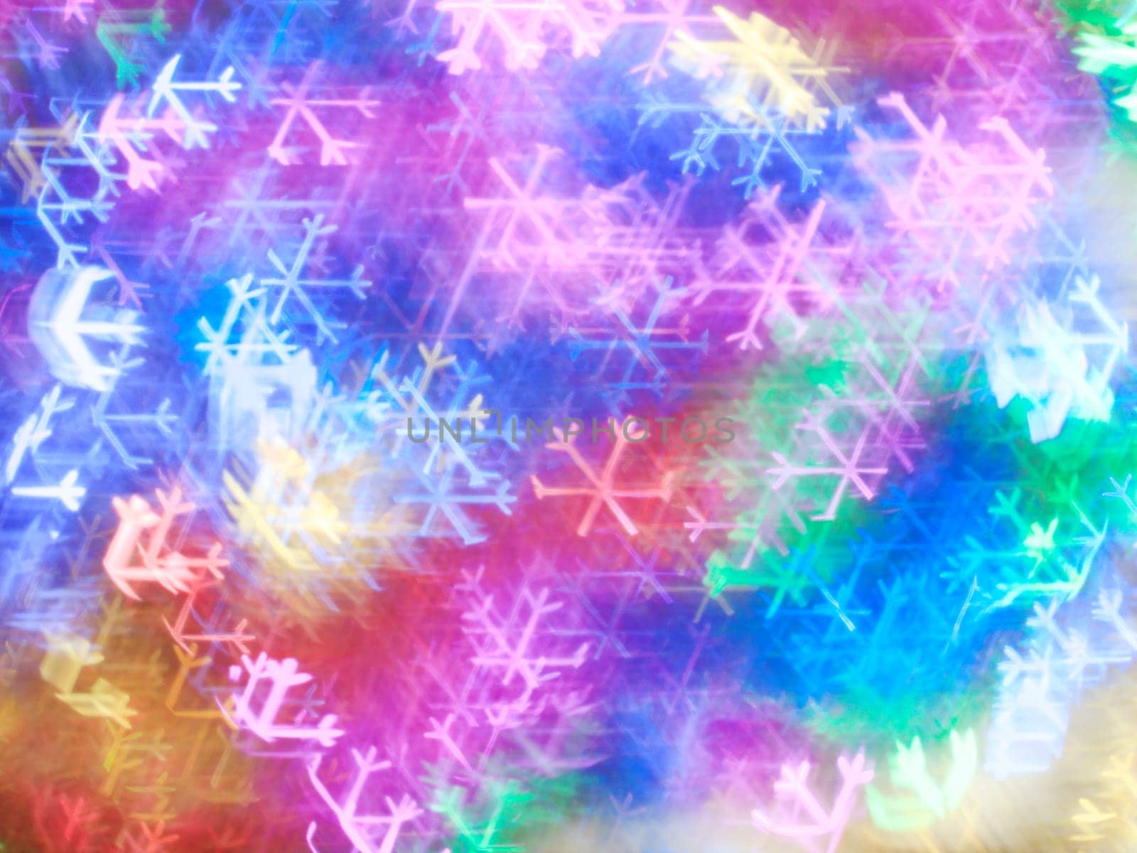 Colorful Christmas background with colorful snow flakes