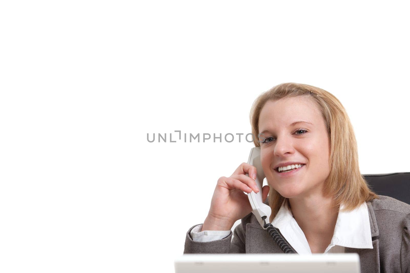 Young woman smiling on the phone