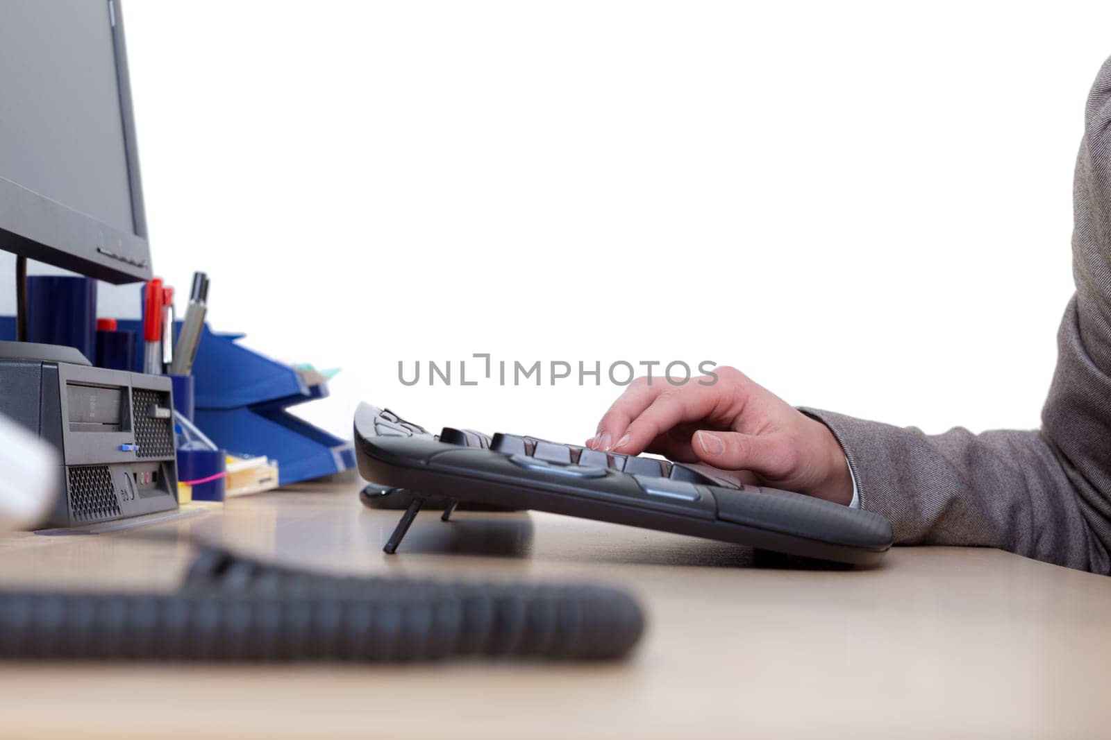 Woman's hand on computer keyboard