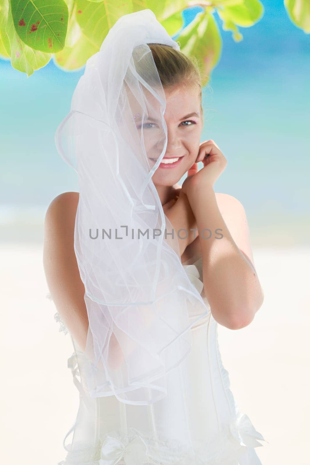 Beautiful young  bride on the tropical beach