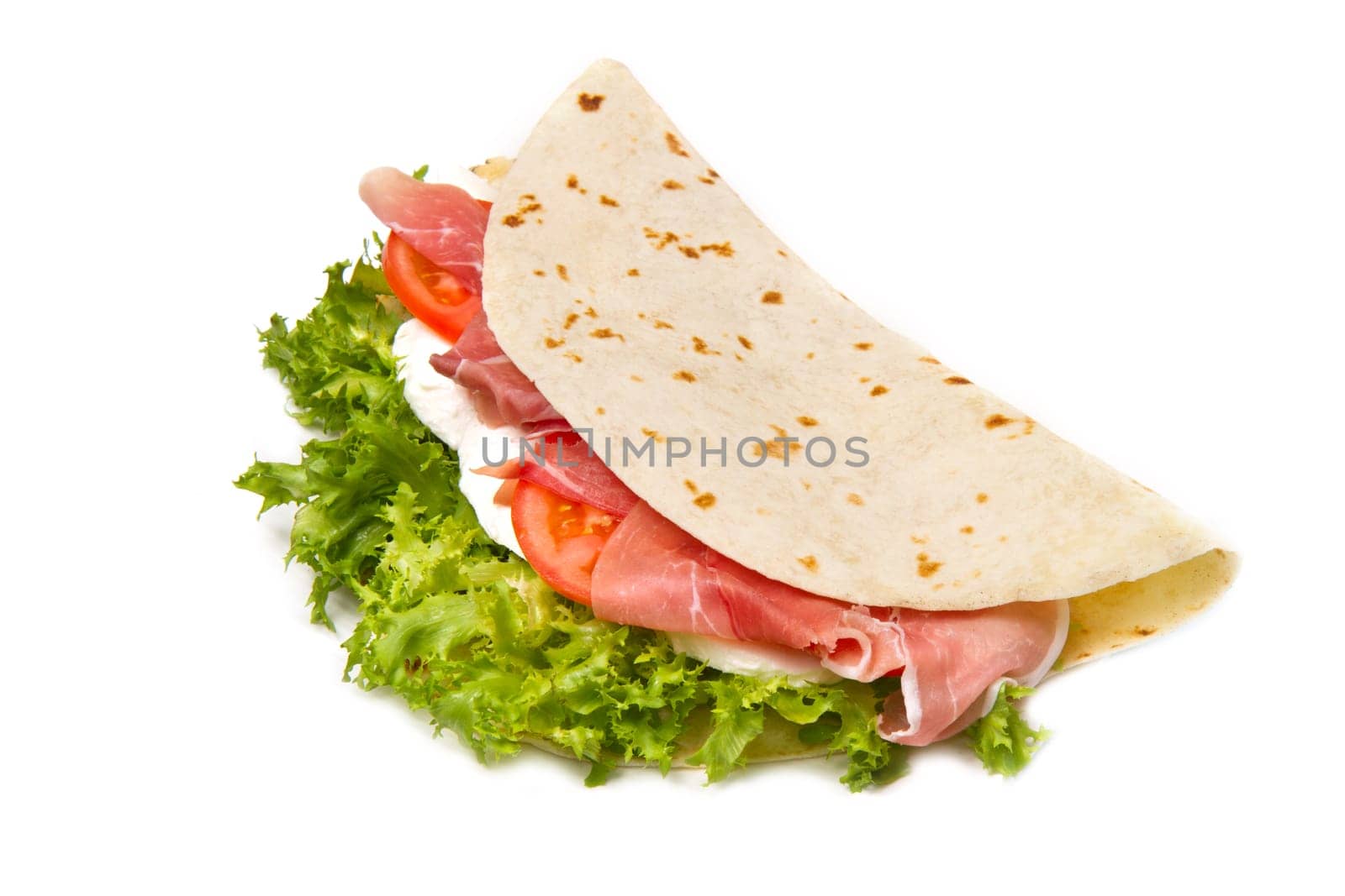 italian piadina with ham, fresh salad and mozzarella cheese