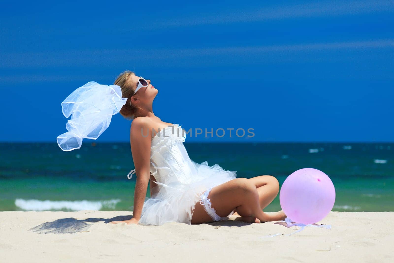 Beautiful young  bride on the tropical beach