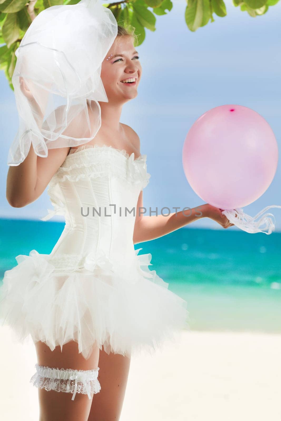 Beautiful young  bride on the tropical beach