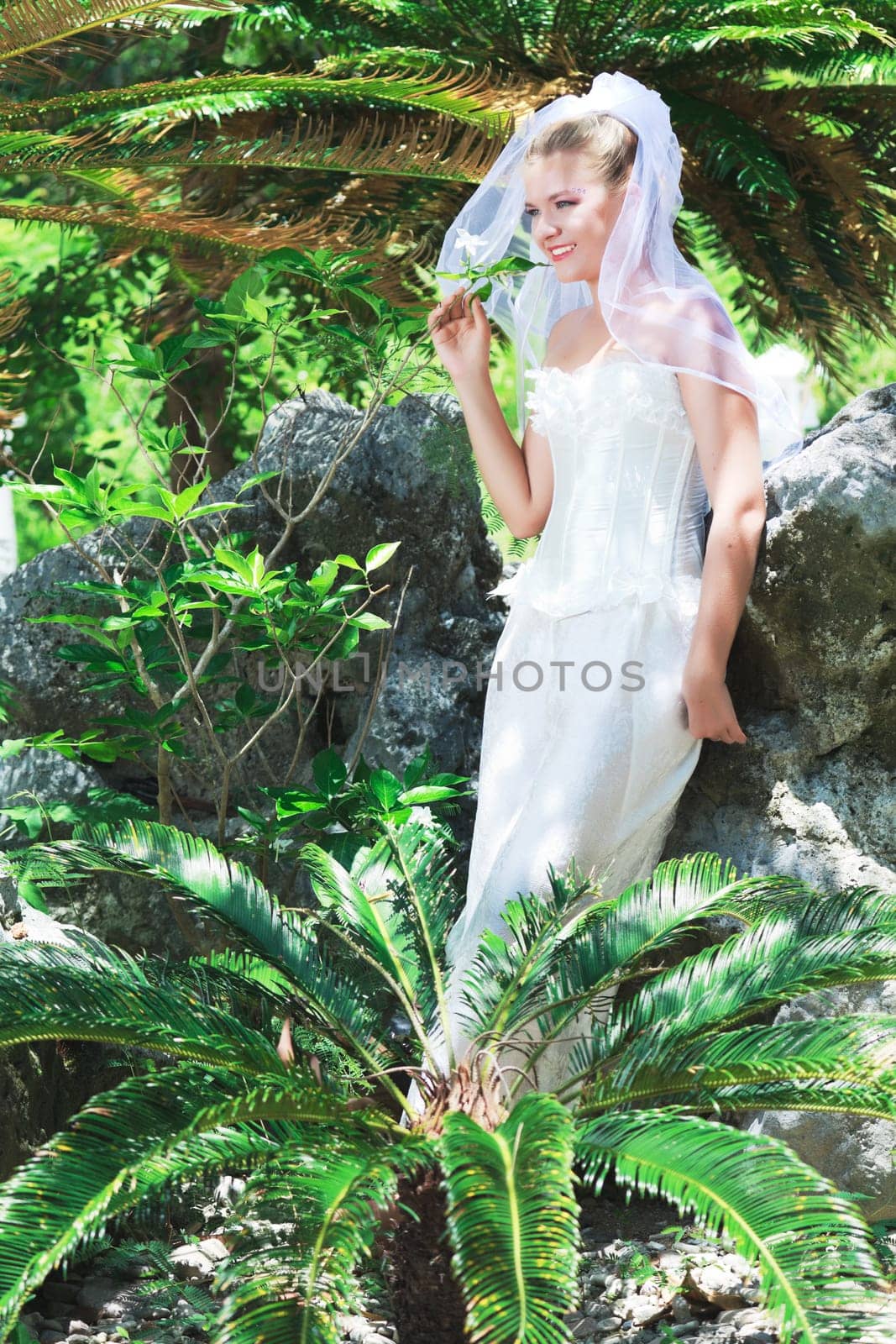 Beautiful young  bride on the tropical beach