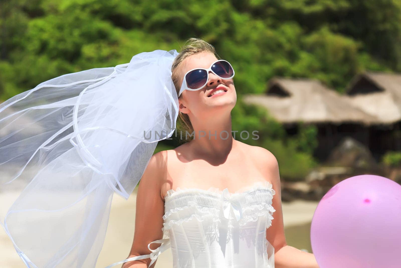 Beautiful young  bride on the tropical beach