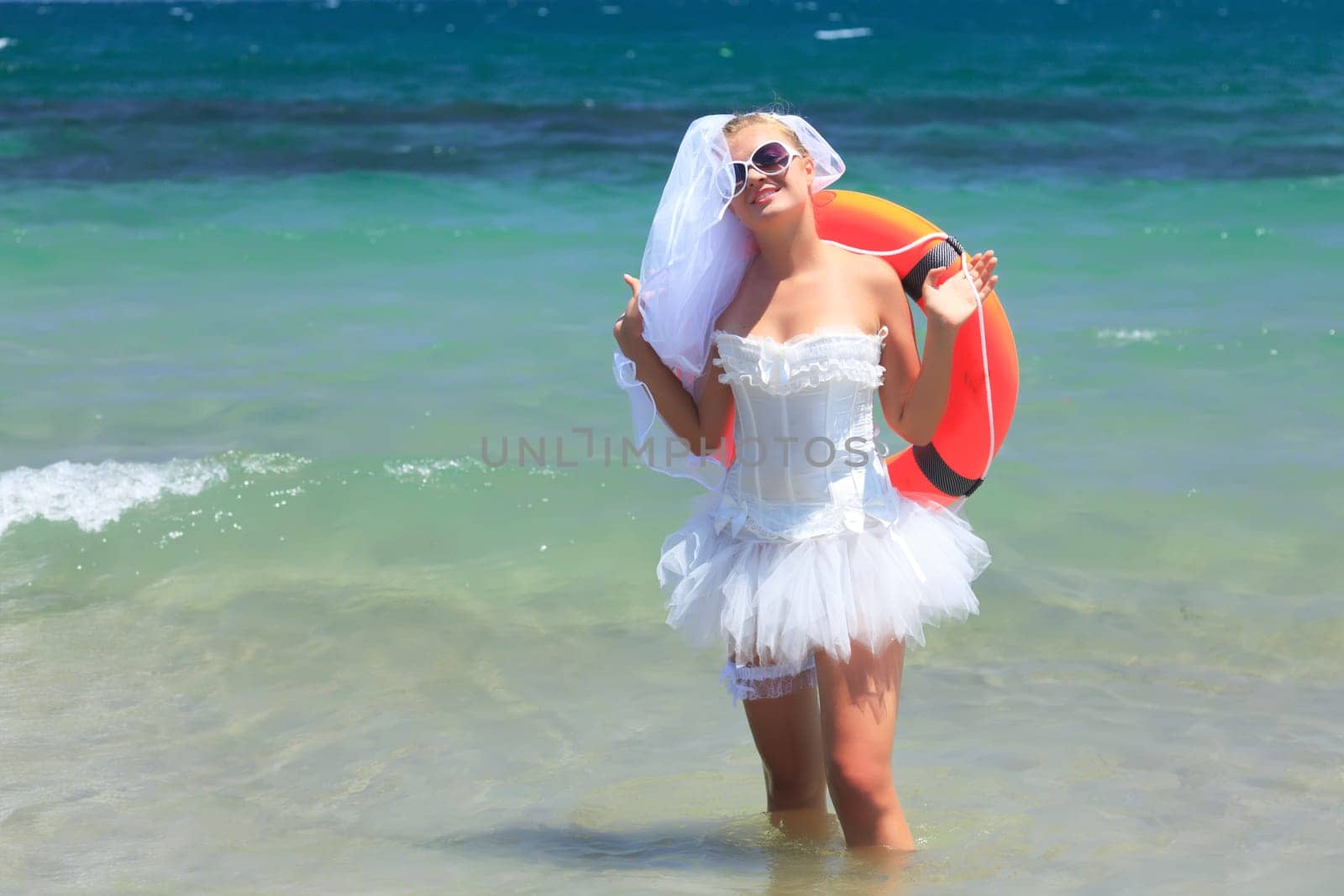 Beautiful young  bride on the tropical beach