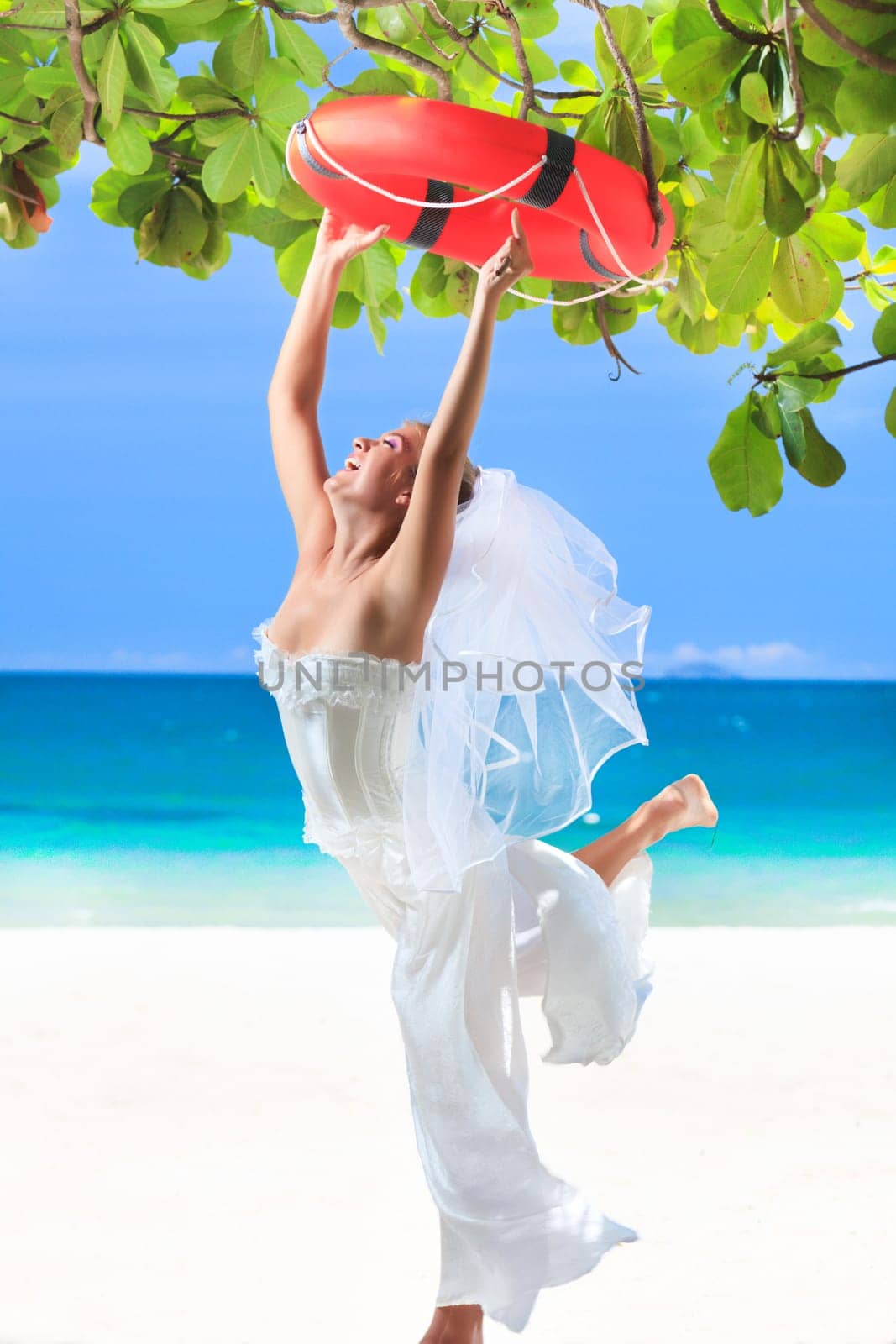 Beautiful young  bride on the tropical beach