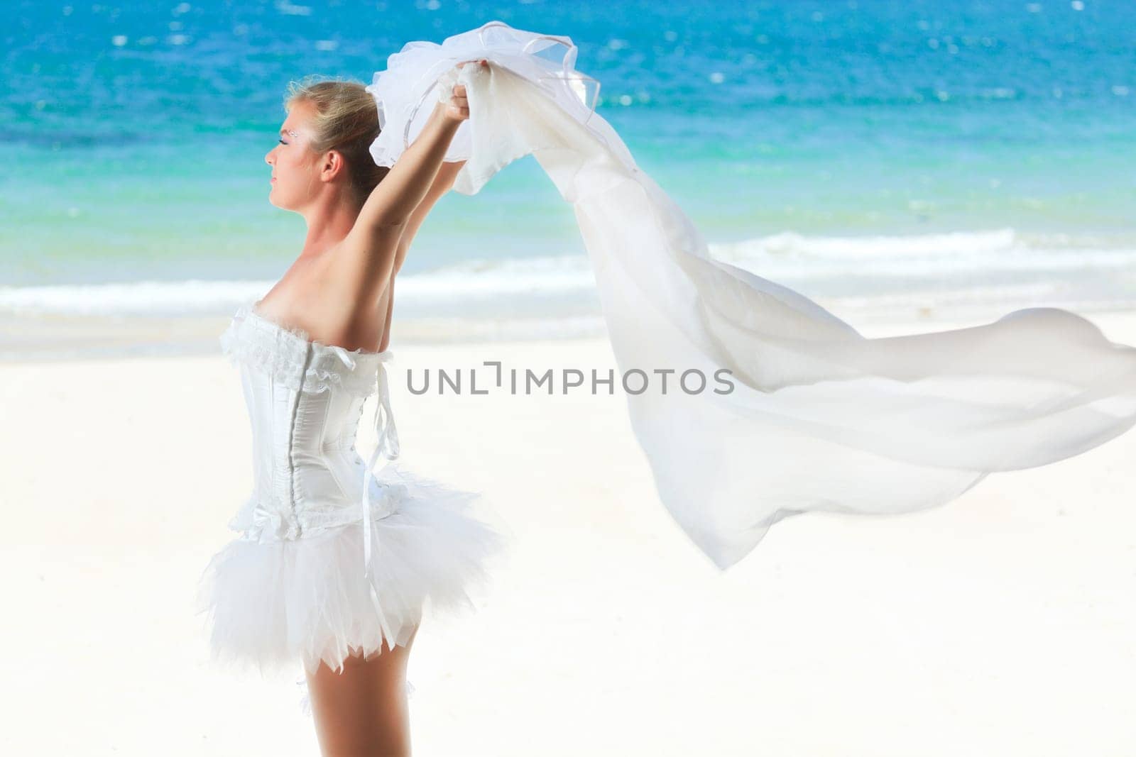 Beautiful young  bride on the tropical beach