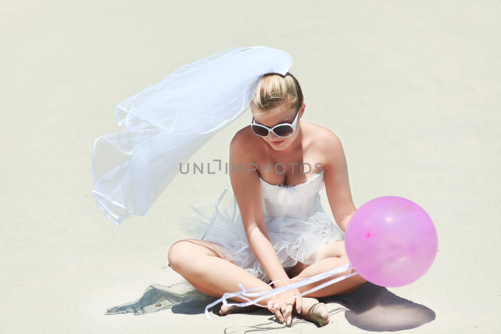 Beautiful young bride on the tropical beach