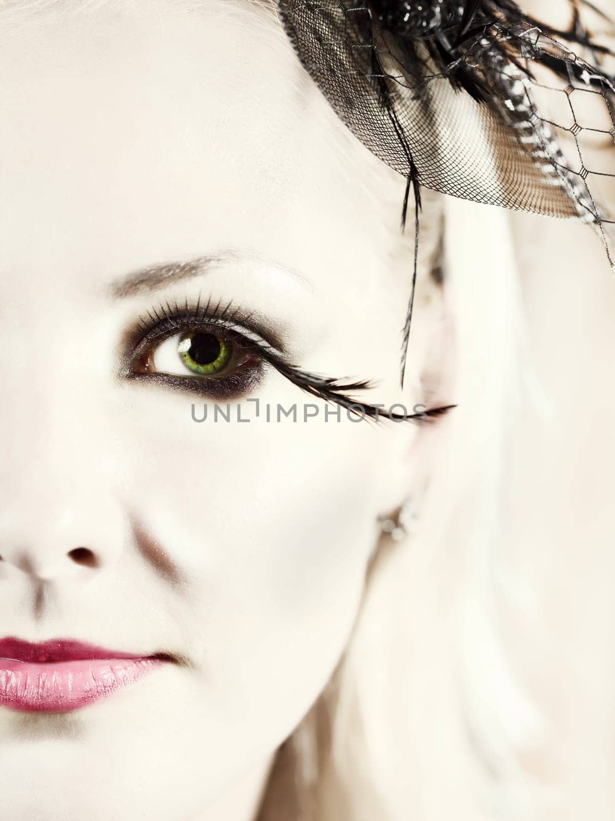 High key portrait of young fashion woman