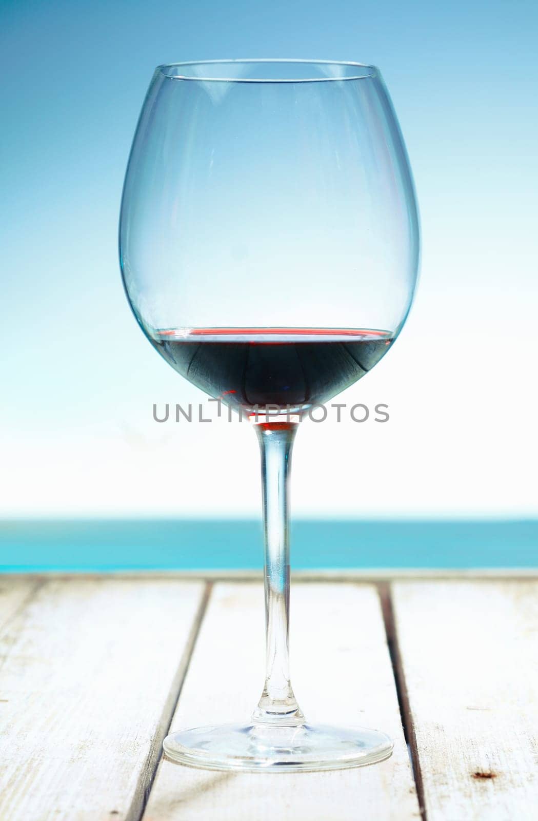 A Glass of Wine at the beach, standing on a footbridge in the south pacific. For your potable concepts take a look at my portofolio.