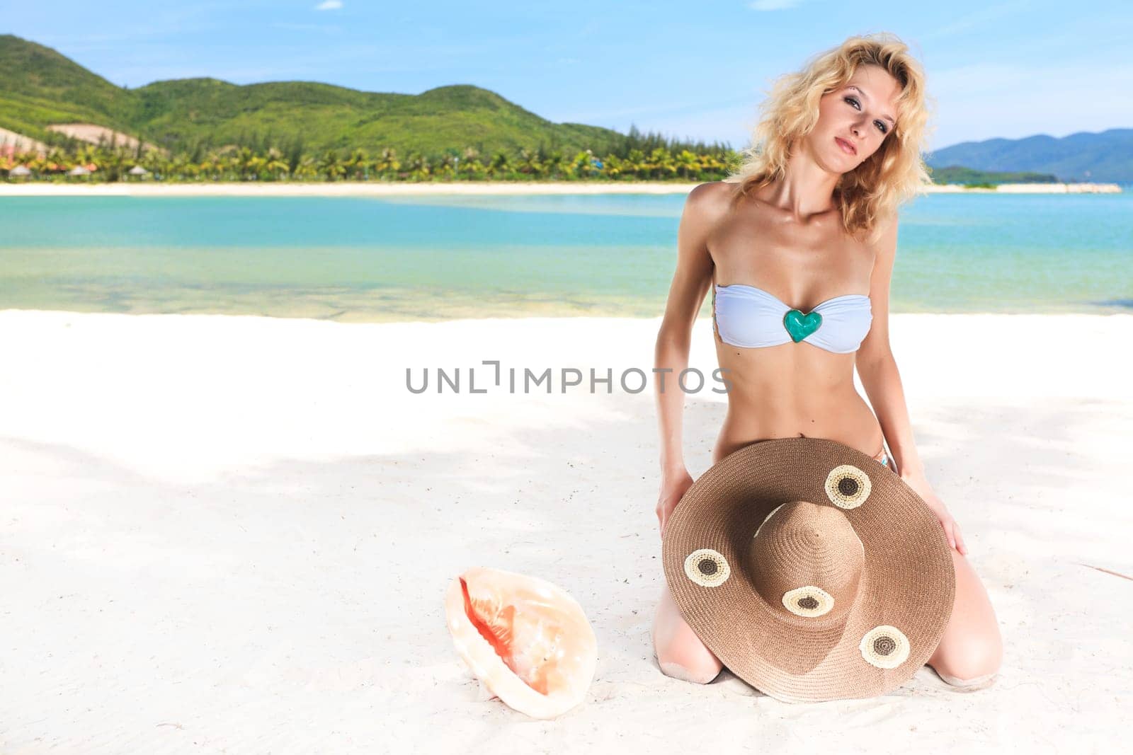 Beautiful woman in bikini on the beach